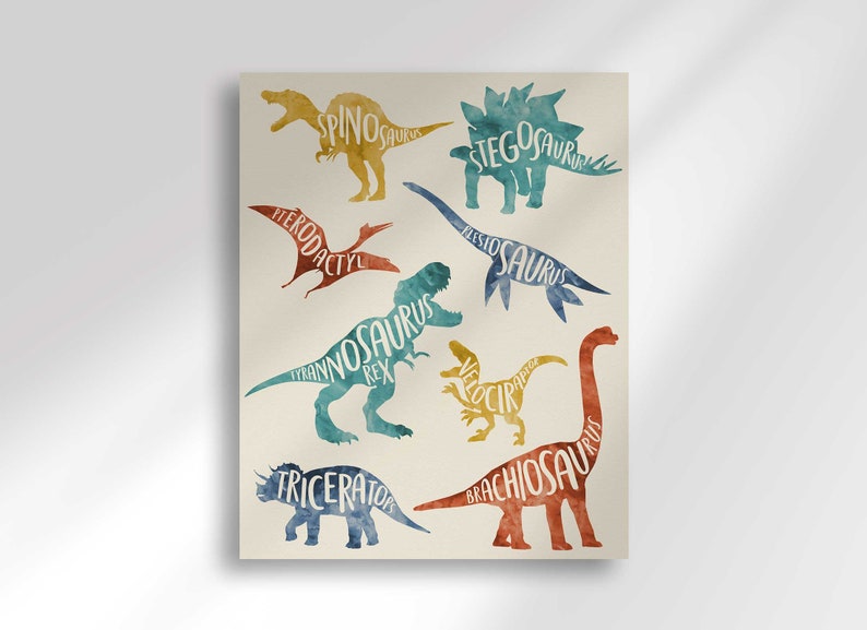 May include: A watercolor illustration of different dinosaurs with their names written inside their silhouettes. The dinosaurs are in various colors, including blue, green, red, and yellow. The background is a light beige.