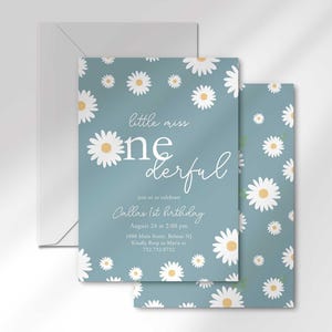 The 'Little Miss ONEderful' invitation for Callie layered in front of its matching envelope and a second card showing the daisy pattern back design.