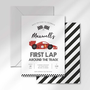 Maxwell's race car-themed invitation layered in front of its matching envelope and a second card showing a black and white diagonal road-stripe back design.