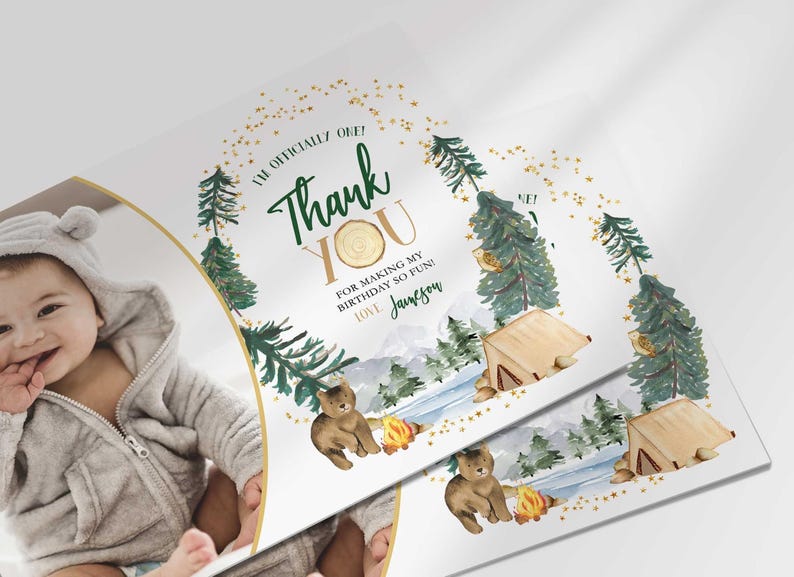 Angled close-up of Jameson's camping-themed thank you photo card with the baby's photo mockup, showing the pine tree and bear illustrations with the thank you message.