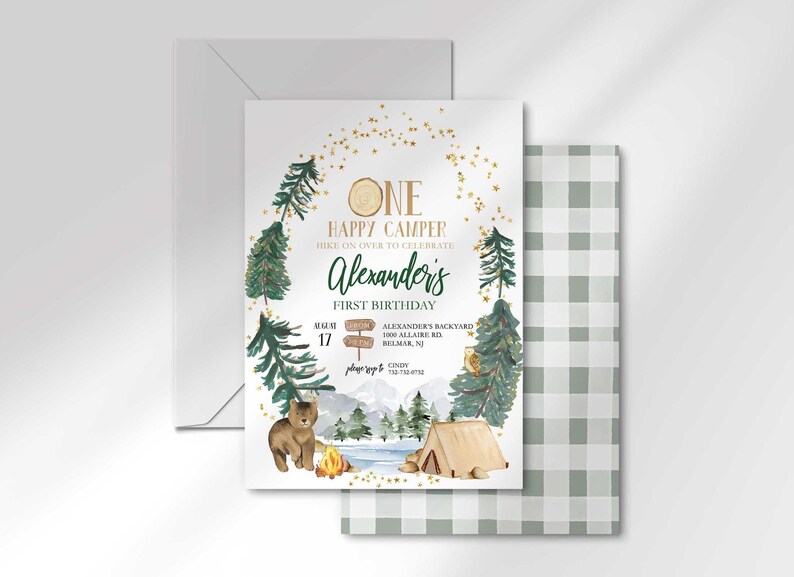 Alexander's camping-themed invitation layered in front of its matching envelope and a second card showing the sage green plaid back design.