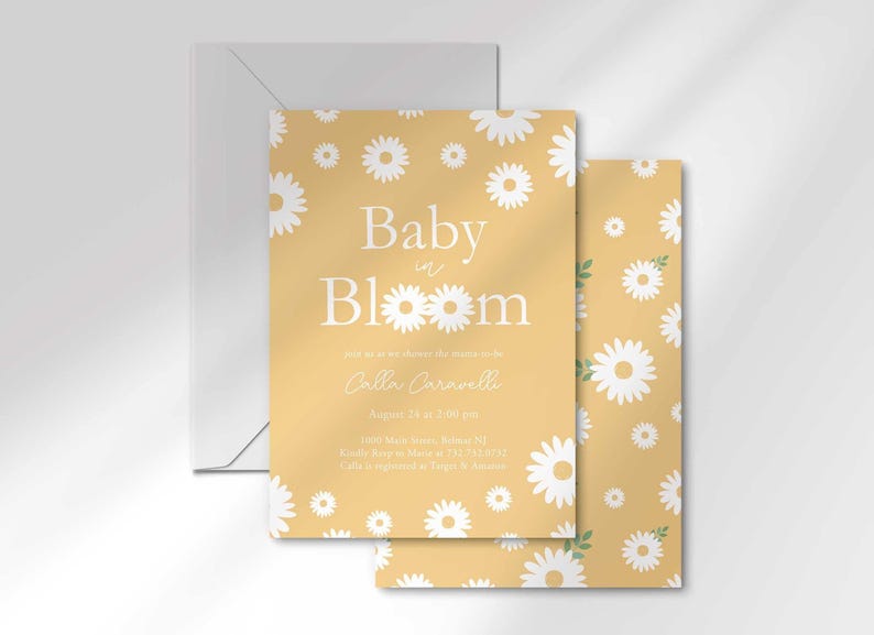 The 'Baby in Bloom' invitation for Calla Caravelli layered in front of its matching envelope and a second card showing the daisy pattern back design.
