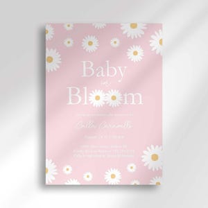 Daisy-themed baby shower invitation in bright pink with a white daisy pattern, reading 'Baby in Bloom' for Calla Caravelli, with the party date, time, location, and registry details.