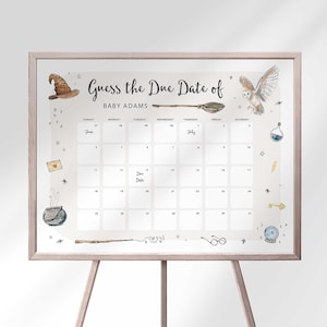 Harry Potter themed guess the due date sign in a wood frame on an easel, with a witch hat, owl, wand, and potion bottle around a blank calendar for guests to guess baby's birth date.