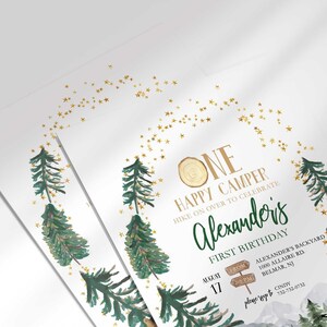 Angled close-up of Alexander's camping-themed first birthday invitation, showing the pine tree and gold star illustrations with party details.