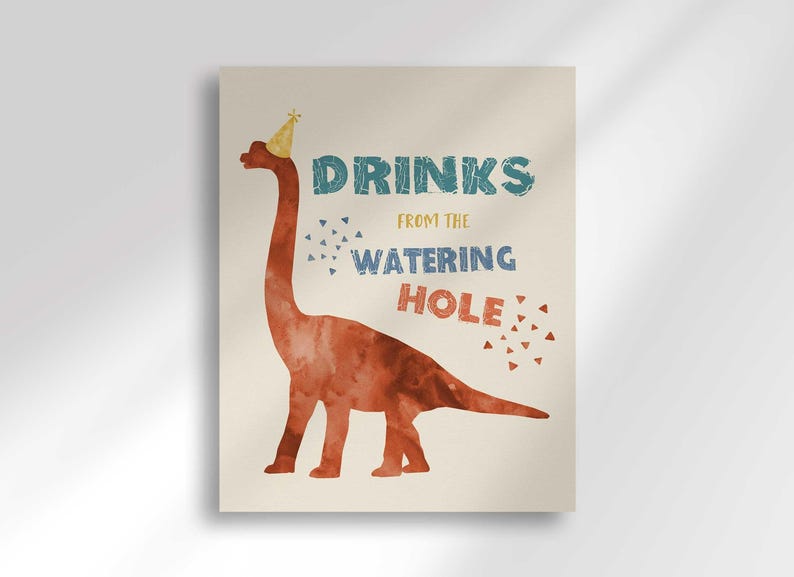 'Drinks From the Watering Hole' beverage station sign featuring a rust-colored brontosaurus illustration wearing a yellow party hat.