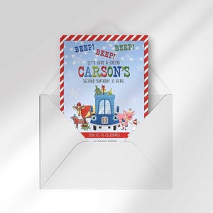 Carson's winter truck-themed birthday invitation peeking out of an open envelope against a white background.