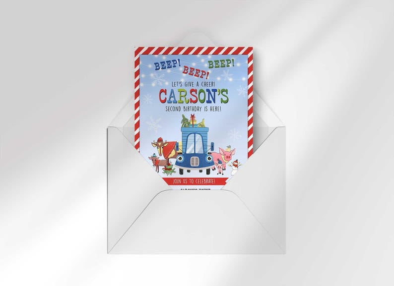 Carson's winter truck-themed birthday invitation peeking out of an open envelope against a white background.