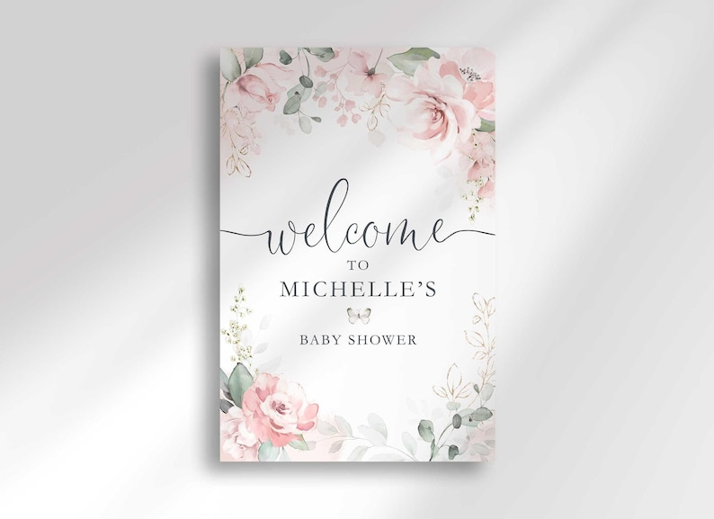 Flat close-up print mockup of the full "Welcome to Michelle's Baby Shower" sign design, showing the blush pink floral corner details and a small butterfly accent clearly.