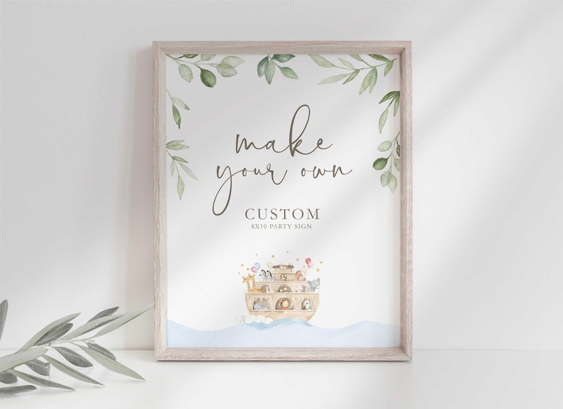 A framed 8x10 custom Noah's Ark party sign rests against a white wall with foliage and watercolor animal illustrations.