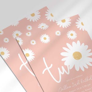 Close-up angled shot of the 'TWO' daisy-themed invitation for Callie's 2nd birthday in pink, showing the print quality and daisy pattern detail.