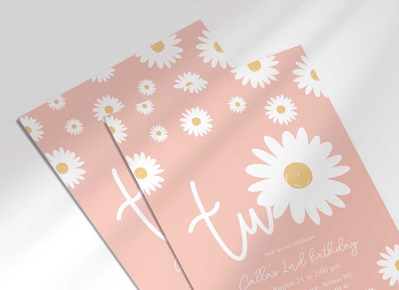 Close-up angled shot of the 'TWO' daisy-themed invitation for Callie's 2nd birthday in pink, showing the print quality and daisy pattern detail.
