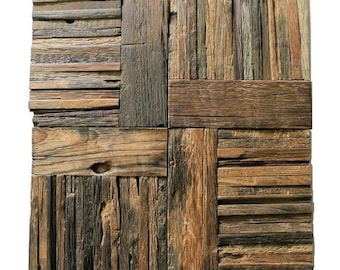 May include: A wall panel made of reclaimed wood with a rustic, natural finish. The panel is made up of various sized pieces of wood, arranged in a geometric pattern. The wood has a natural brown color with some darker brown and gray tones.