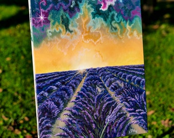 May include: An original painting on canvas depicts a lavender field under a vibrant sky. The artwork features rows of purple lavender leading to a bright, yellow sun. The sky transitions from yellow to teal, purple, and pink, with a prominent star.