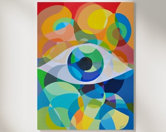 May include: Abstract eye art print. The artwork features a large eye with a white outline, a green iris, and a black pupil. The background is filled with overlapping colorful shapes in shades of red, orange, yellow, blue, and green.