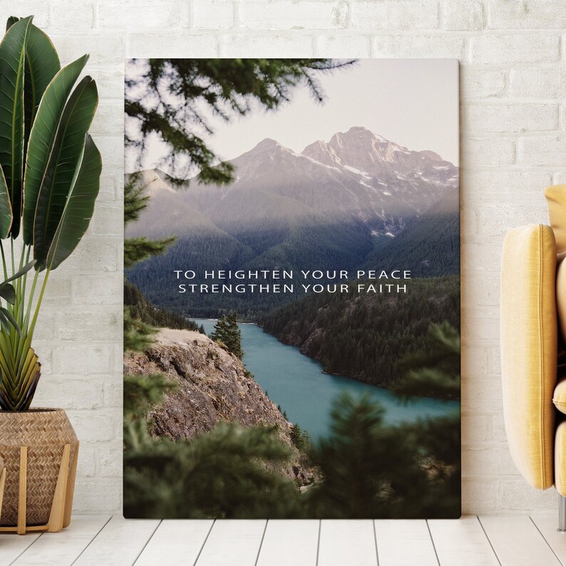 May include: A motivational quote, "To heighten your peace, strengthen your faith", is displayed over a scenic landscape photograph of a mountain range, a lake, and trees.