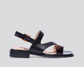 Anto Flat Thong Buckle Sandal in Black