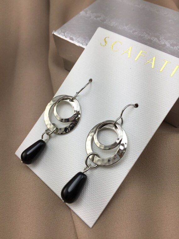under black earring