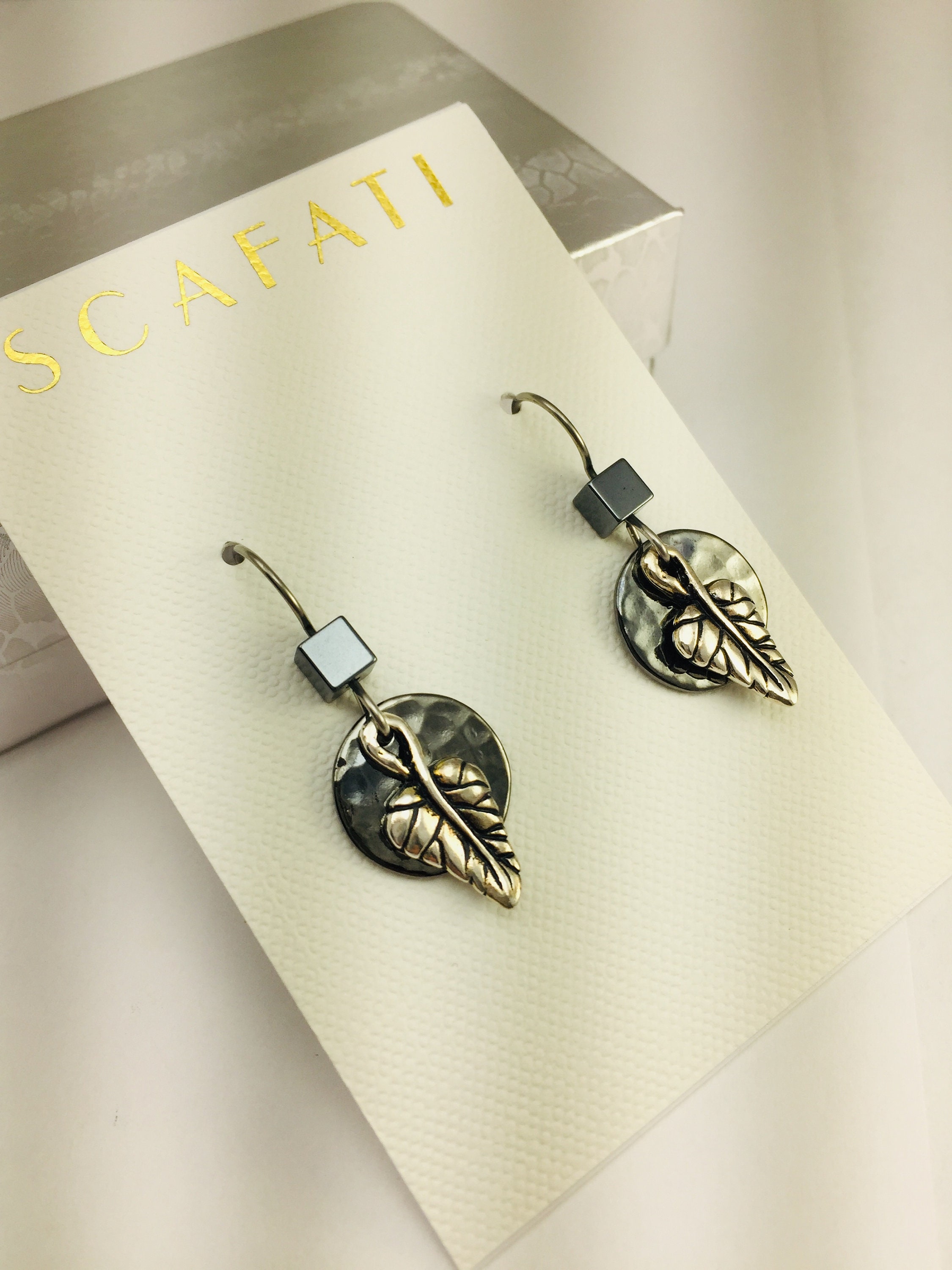 under black earring