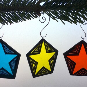 Set of 3 stained glass Christmas star tree decorations. Yellow, blue, orange