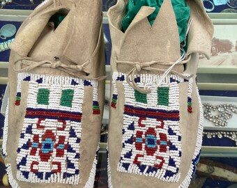 Pair glass beaded sinew sown moccasins leather