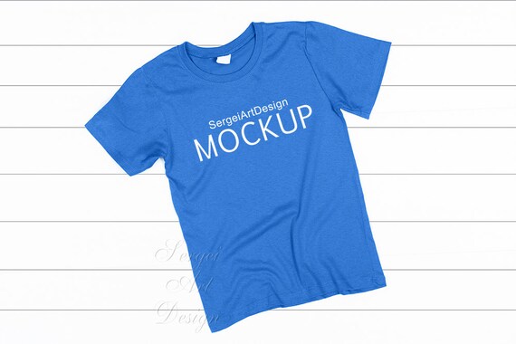 Download Free Blue Shirt Realistic Mockup Styled Stock Blue T-Shirt ...