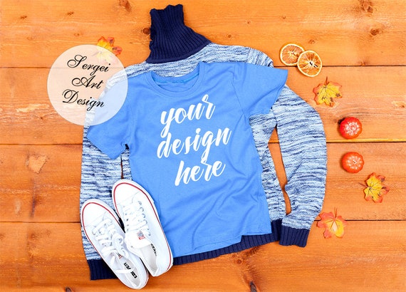 T-Shirt Mockup Blue T-Shirt On The Warm Sweater Jpg