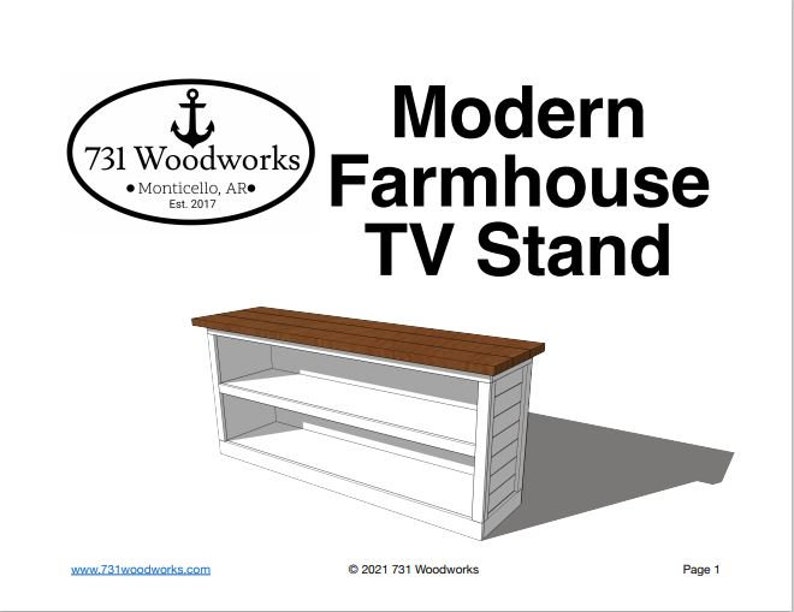 May include: A white farmhouse style TV stand with two shelves and a brown wood top. The stand is made of wood and has a modern design.