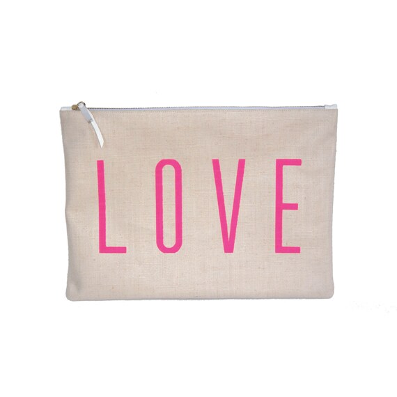 neon pink clutch bag