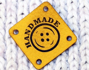 Handgemaakt kunstleer Tags: gele veganistische kledinglabels