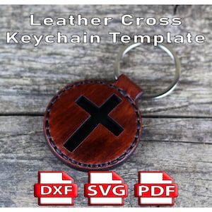 Könnte beinhalten: Ein runder, brauner Leder-Schlüsselanhänger mit einem schwarzen Kreuz-Ausschnitt. Der Schlüsselanhänger hat einen silbernen Ring und den Text "Leather Cross Keychain Template". Darunter befinden sich DXF-, SVG- und PDF-Dateisymbole.
