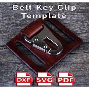 Può includere: Modello di clip per chiavi da cintura in pelle marrone con chiusura in metallo argentato. Il testo "Belt Key Clip Template" è in alto. Sotto sono presenti icone di file DXF, SVG e PDF.