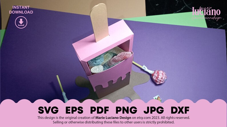 May include: A pink and brown popsicle shaped box with a clear window filled with colorful candy. The box is sitting on a brown surface with a purple background. The text "SVG EPS PDF PNG JPG DXF" is at the bottom of the image.