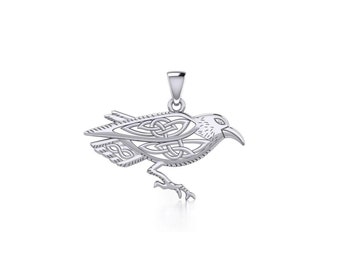 May include: A silver Celtic knotwork raven pendant. The raven is depicted in a detailed, intricate design with its wings spread.