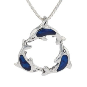 May include: Silver necklace with a pendant of three blue enamel dolphins forming a circle.