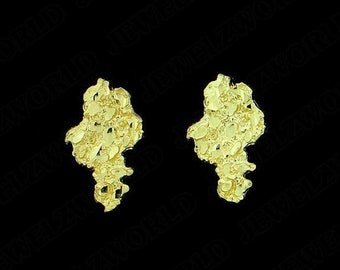 May include: A pair of yellow gold stud earrings featuring an irregular, textured nugget design. Each earring has a highly reflective, bumpy surface with organic, asymmetrical edges, showcasing a metallic finish against a dark background.
