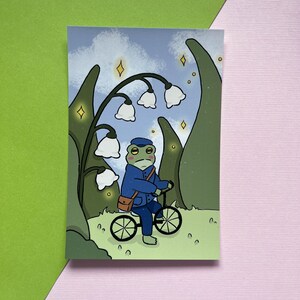 Rechthoekige kikker fiets door de tuin Art Print | Schattige kikker kunstafdruk | Mat, Wanddecoratie, Esthetische kunst, Vierkante kunstafdruk