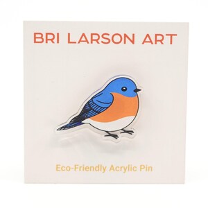 Bluebird Eco-Friendly Clear Acrylic Pin 1.25 inches, made from 100% recycled acrylic