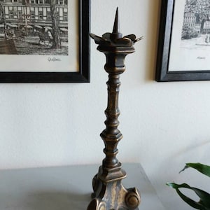 Antique bronze church candlestick