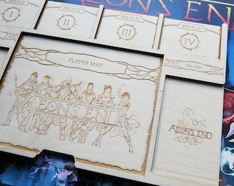 May include: A wooden game organizer for the board game Aeons End. The organizer has slots for the game's cards, a player mat, and a discard pile. The organizer is engraved with the game's logo and the text "Breach I, II, III, IV".
