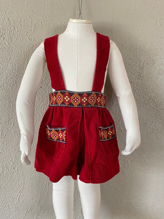 red overall skirt