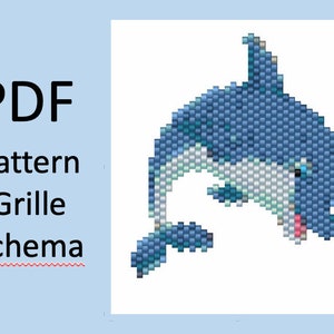 Könnte beinhalten: Ein digitales PDF-Muster für ein Perlen-Delphin-Design. Der Delphin ist in Blau-, Weiß- und Rosatönen gehalten, mit dem Text "PDF Pattern Grille Schema" in Schwarz. Der Hintergrund ist hellblau.