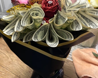 Make every occasion extra special with our stunning money bouquets!  Add a touch of elegance and generosity to your celebrations.