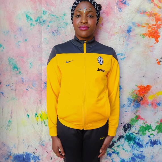 nike yellow and black tracksuit