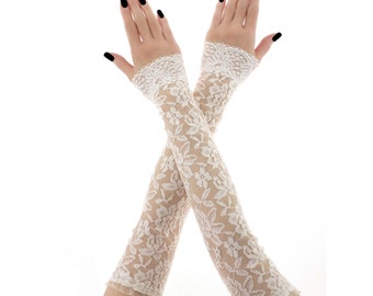 May include: A pair of ivory lace arm warmers with a floral pattern. The gloves extend from the wrist to the upper arm, featuring a delicate scalloped edge at the top and bottom. The lace is detailed and intricate.