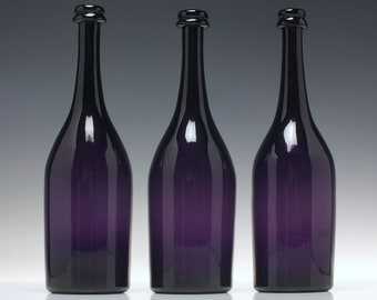 Set of Three Victorian Amethyst Glass Serving Bottles c1830