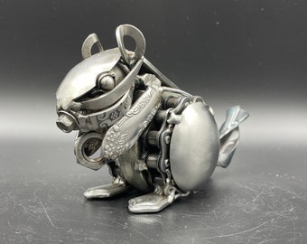 Scrap metal chipmunk sculpture