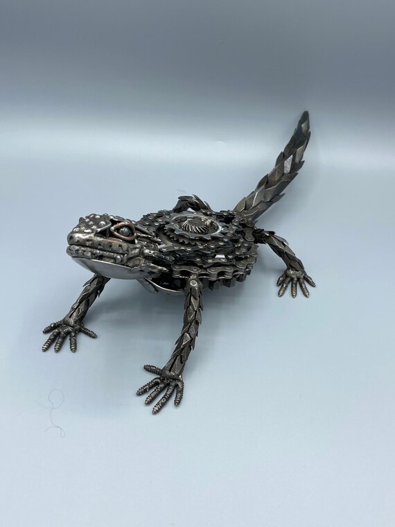Scrap metal armadillo lizard sculpture
