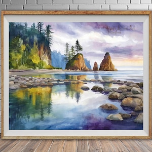 May include: A framed watercolour painting of a coastal scene. The artwork shows a beach with rocks, cliffs, and islands. The sky is a blend of purple, blue, and yellow. The text "Olympic National Park, Kalaloch Beach" is visible in the painting.