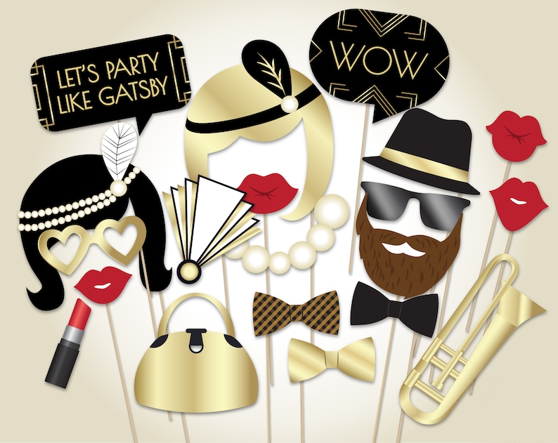 May include: A set of 10 black and gold photo booth props with a 1920s theme. The props include a trumpet, a bow tie, a purse, a lipstick, a pair of sunglasses, a beard, a hat, a flapper headband, a flapper headband with a feather, and two speech bubbles that say "Let's Party Like Gatsby" and "Wow".